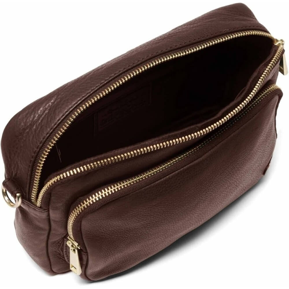 Brown leather crossbody bag with gold accents on a white background depeche 14132