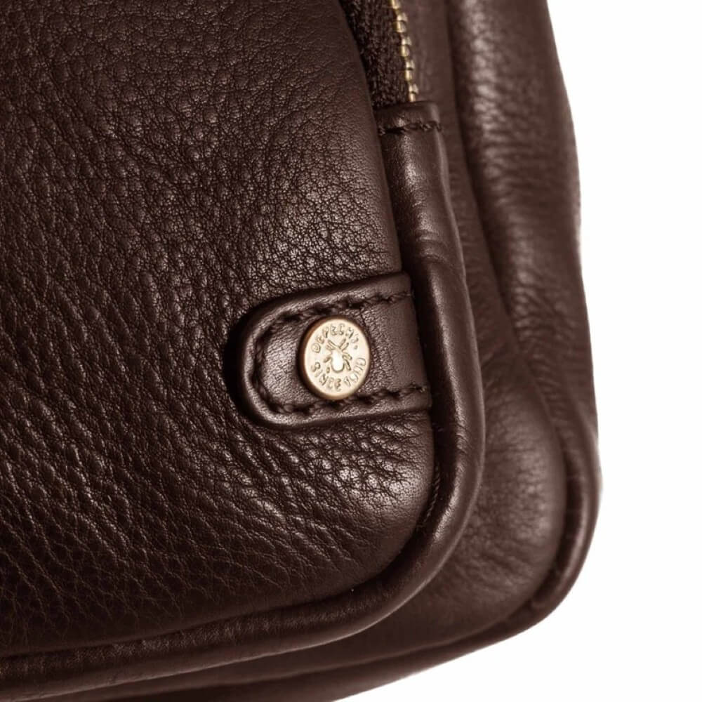 Brown leather crossbody bag with gold accents on a white background depeche 14132