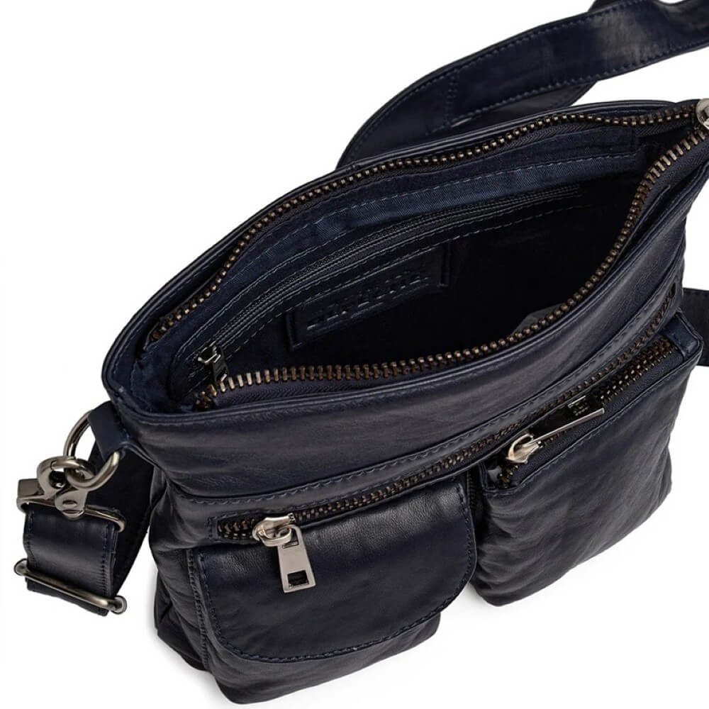 Navy leather crossbody bag with multiple pockets and zippers on a white background