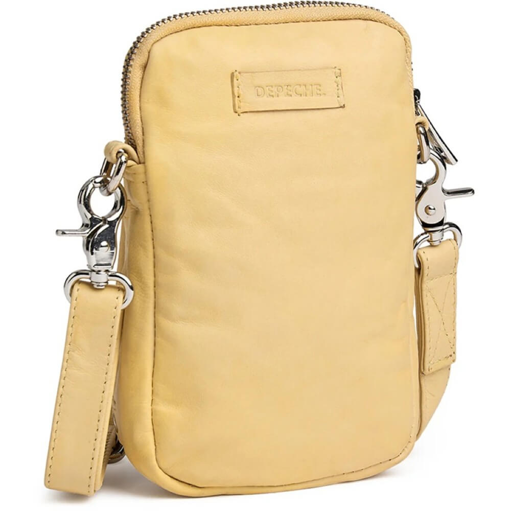 Depeche Yellow Leather crossbody bag with multiple zippers on a white background