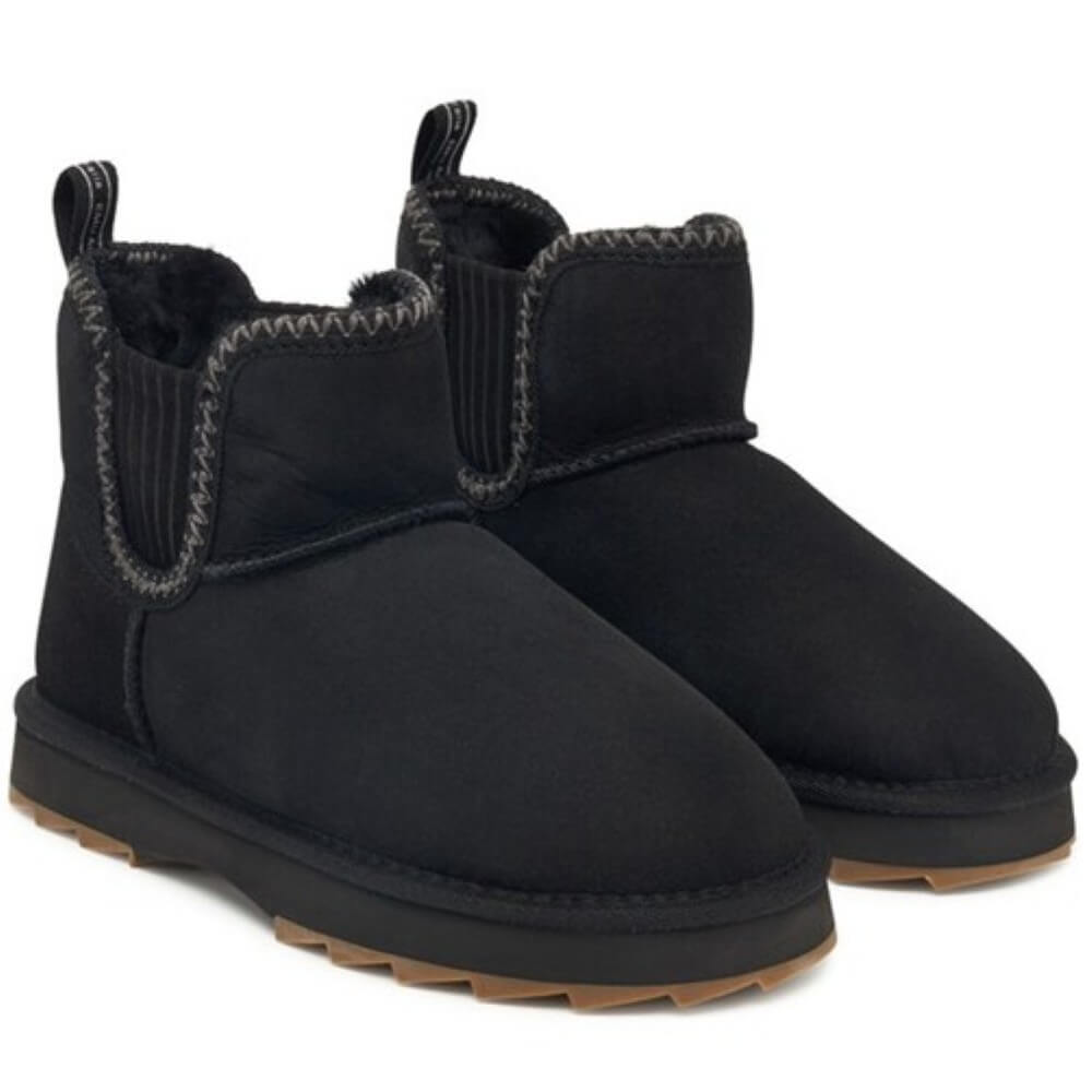 Pair of black slip-on boots with brown soles on a white background EMU Higgie Black
