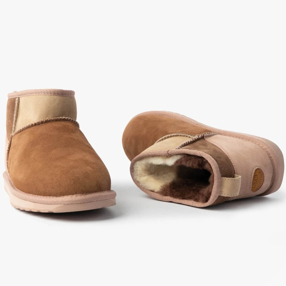 Pair of brown suede slippers with beige interior on a white background EMU Stinger Micro Patchwork