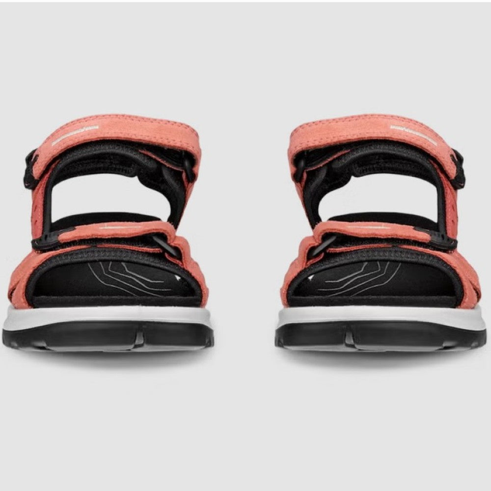 Pair of Ecco Coral, Pink and black walking sandals on a grey background