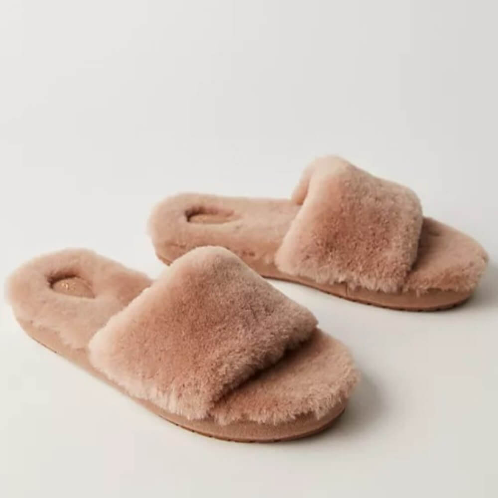 Pair of camel fuzzy slippers on a light gray background Emu Mckay Sheepskin Slippers Camel
