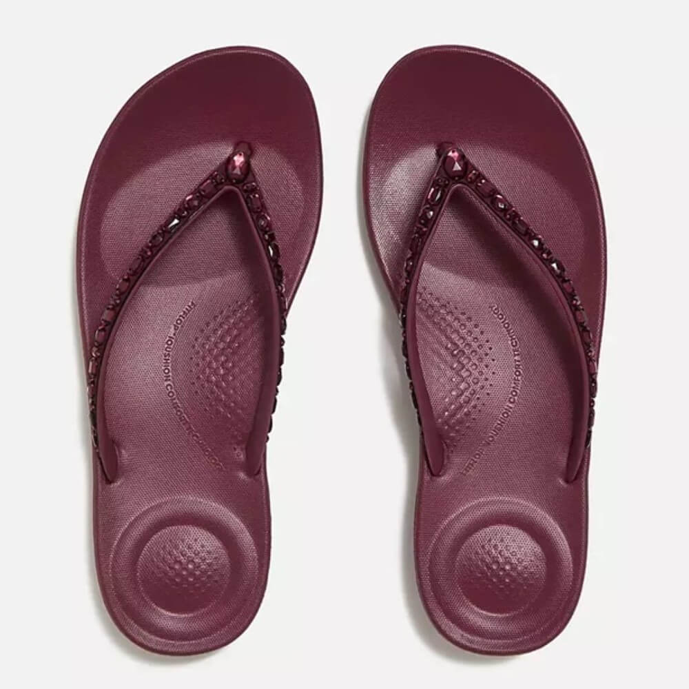 Fitflop Wine flip-flop sandals with decorative straps on a white background