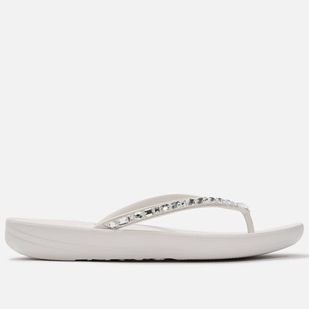 Fitflop White sandal with a decorative strap on a white background