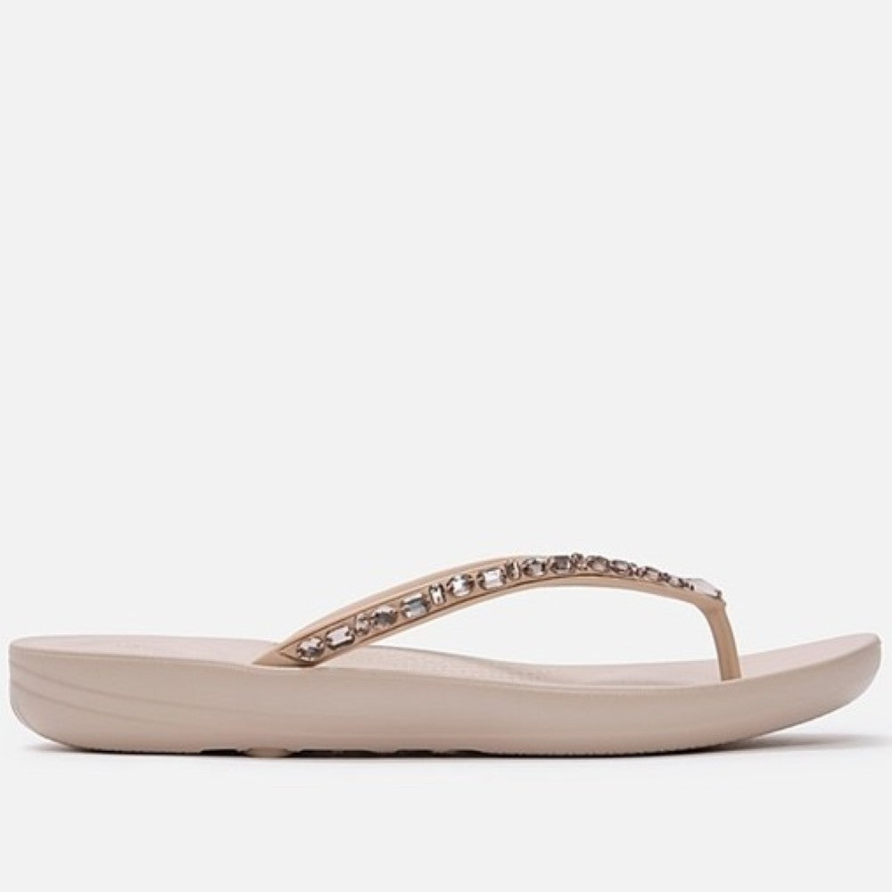 Fitflop nude rose toe-post sandal with embellishments on a white background
