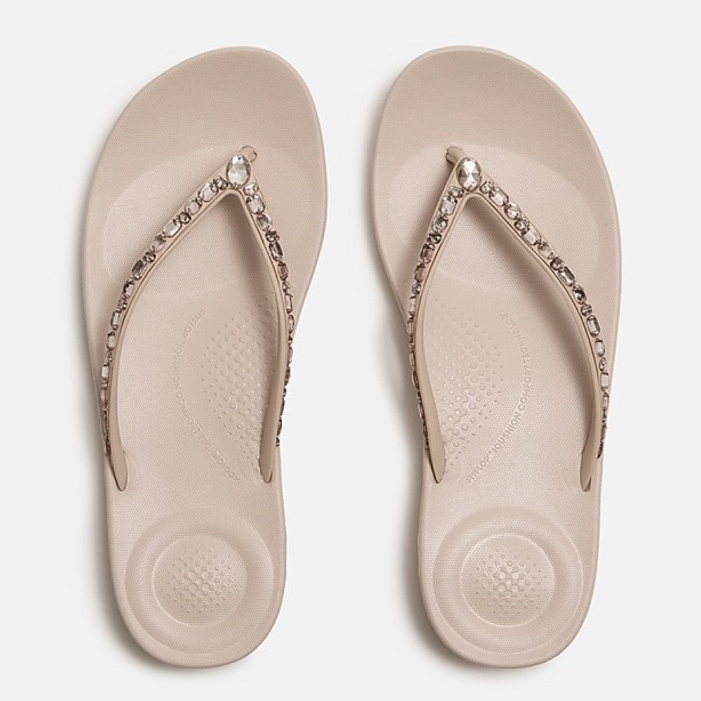 Fitflop nude rose toe-post sandal with embellishments on a white background