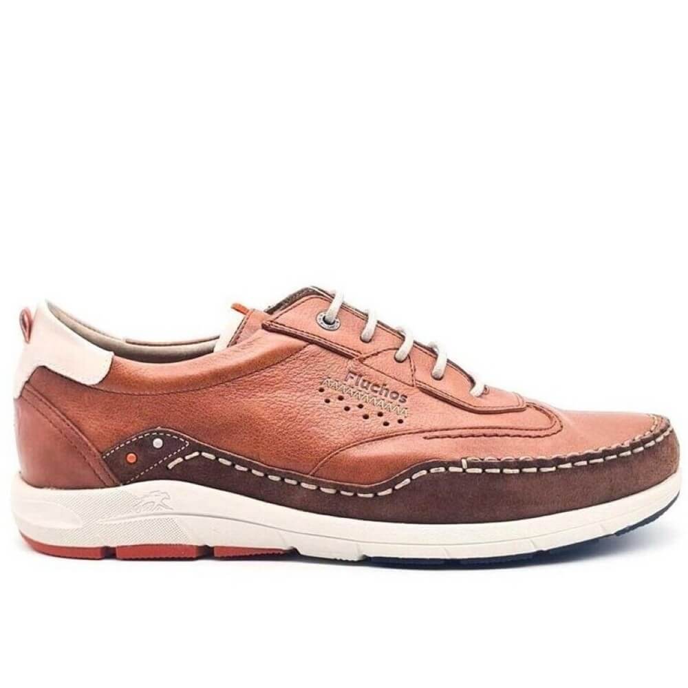 Fluchos Brown leather shoe with white sole on a white background