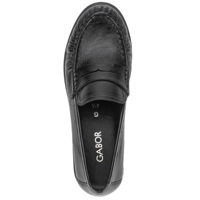 A gabor black leather penny loafer shown from a top-down view on a plain white background. The brand name 'GABOR' is printed in white on the black insole.