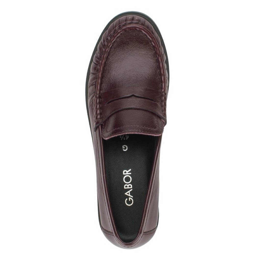 A Gabor Mulberry leather penny loafer shoe with a textured finish and a black sole, shown from a top profile on a white background.