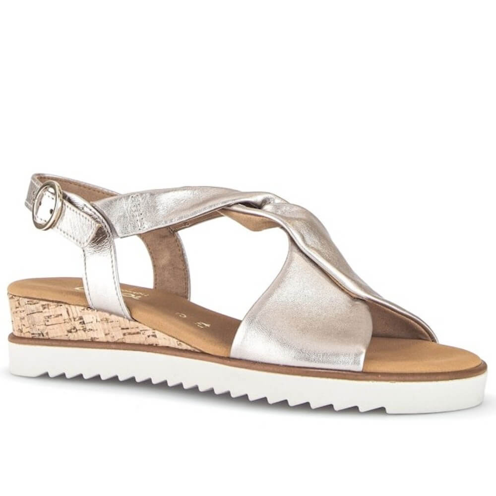 Gabor light gold sandal with a cork wedge sole on a white background