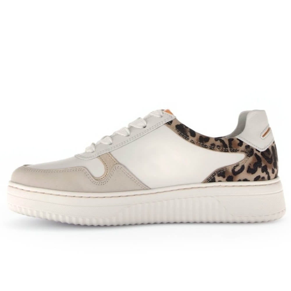 Sneaker with leopard print accent on a white background