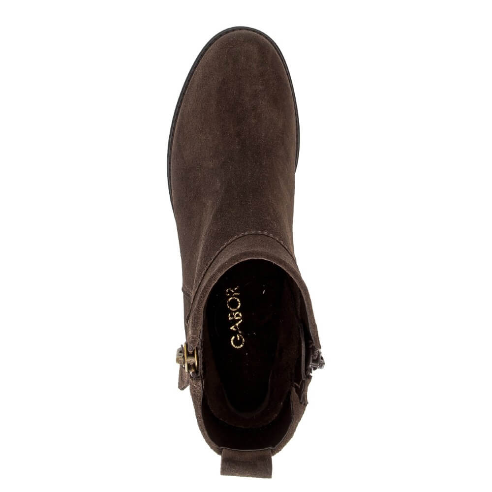 A single dark brown suede ankle boot shown from a top-down view on a plain white background. The boot features a small gold-tone buckle on the side and the brand name 'CABOR' printed in gold on the black interior.