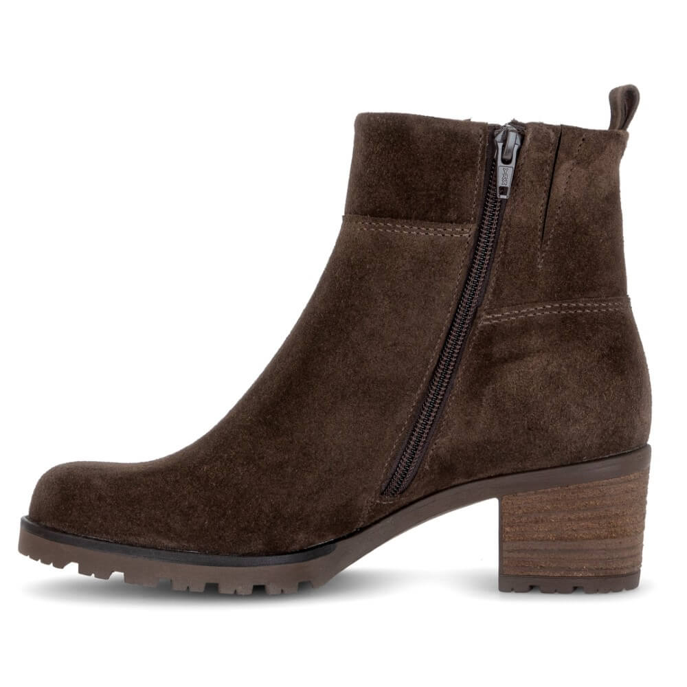 A Gabor dark brown suede ankle boot with a side zipper, block heel, and lug sole, shown from a side profile on a white background.