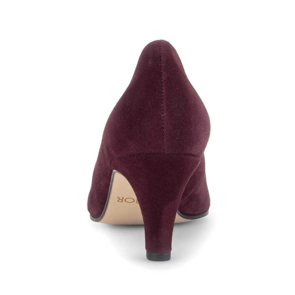 A single burgundy suede pump with a kitten heel, shown from a rear three-quarter view on a white background.