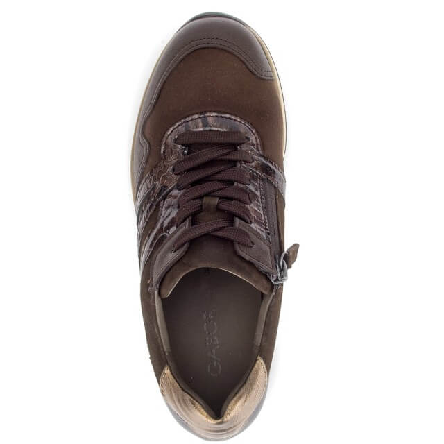 A single brown sneaker shown from a top-down view against a plain white background. The shoe features a mix of suede and textured synthetic materials, dark brown laces, and a visible side zipper.