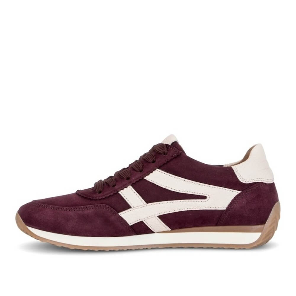 A single Gabor brand low-top sneaker shown from a side view. The shoe features a mulberry wine suede upper with white leather side stripes, beige lining, and brown laces, set against a plain white background.