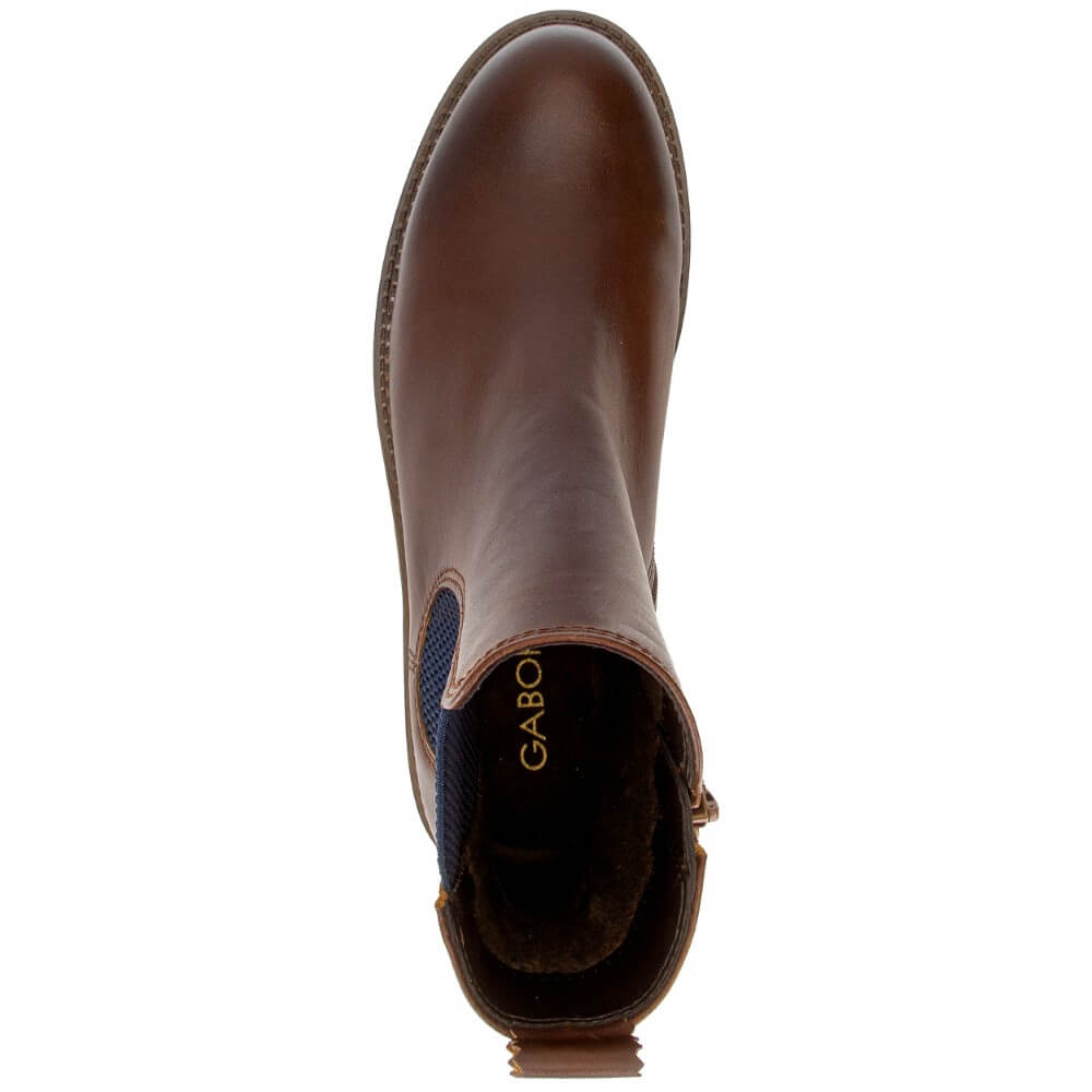 A Gabor single brown leather ankle boot shown from a top-down view on a white background, featuring a navy blue elastic side panel and the brand name 'Gabor' printed in gold on the inner lining.