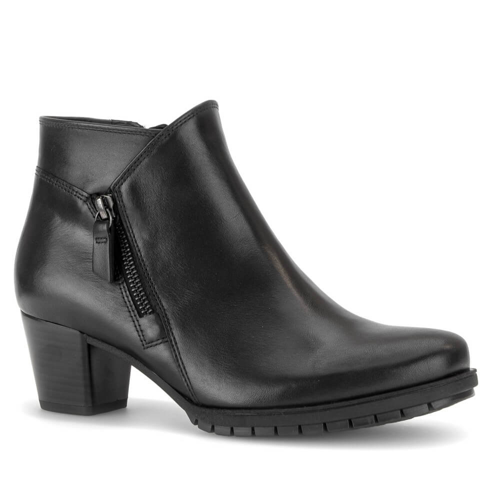 A Gabor black leather ankle boot with a side zipper, block heel, and rounded toe, shown from a three-quarters angle on a white background.