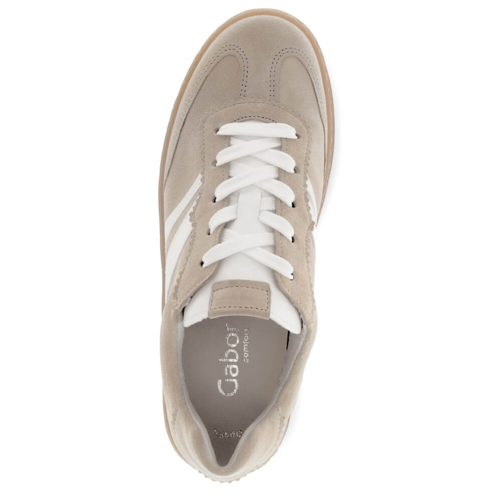 Beige sneaker with white laces on a white background