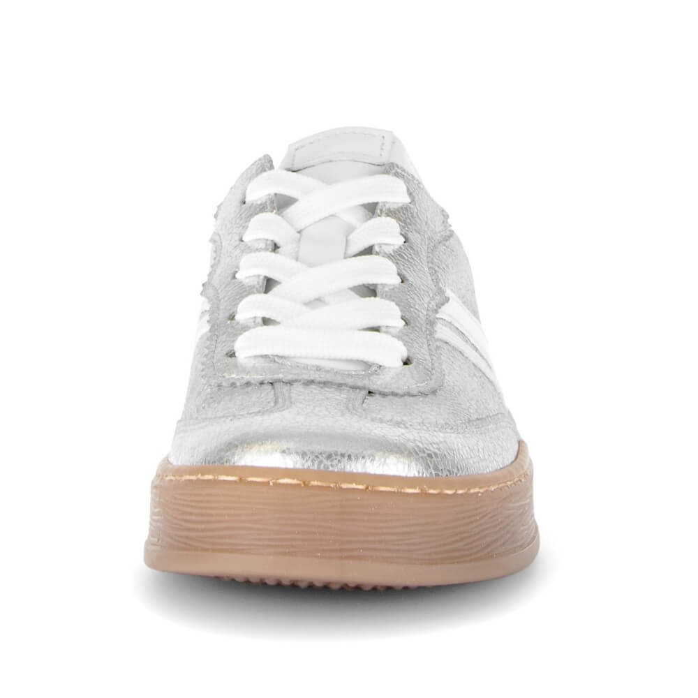 Silver and White sneaker with a brown sole on a white background