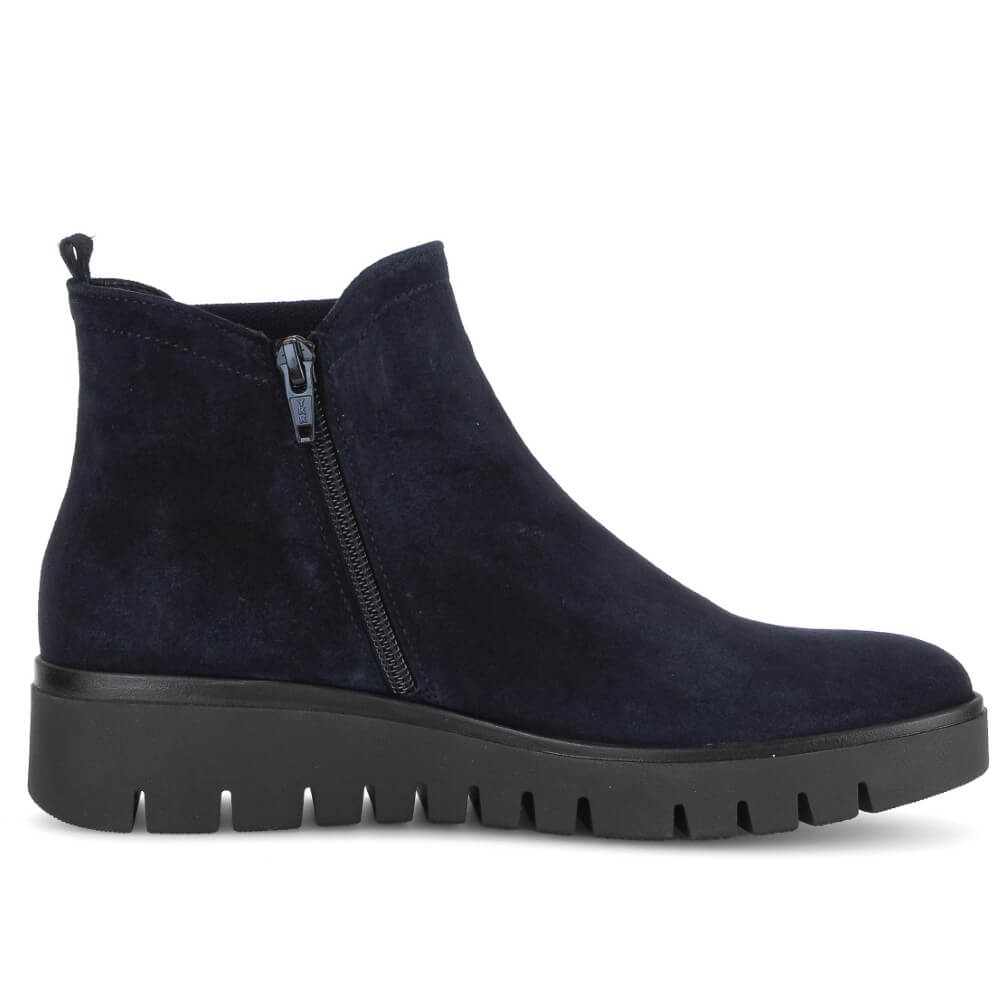 Navy blue ankle boot with a black sole on a white background Gabor Dublin 72.061 Suede Ankle Boots combine classic Chelsea