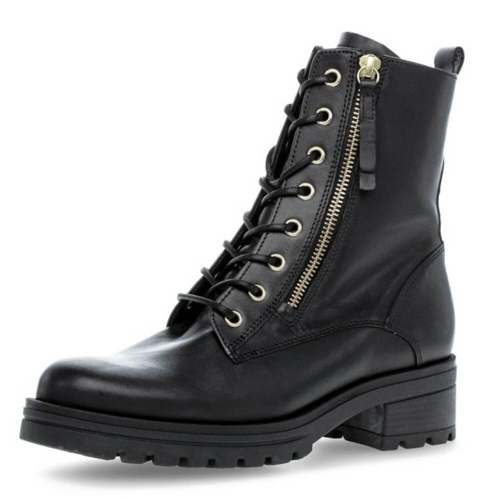 Black leather boot with two gold zippers and laces on a white background Gabor Serve biker boots 72.785 Black