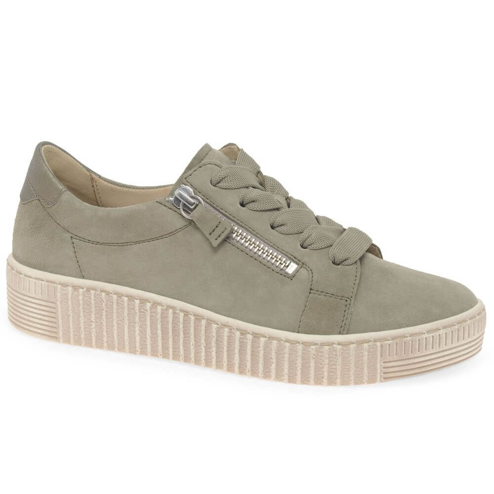 Green sneaker with a zipper on a white background
