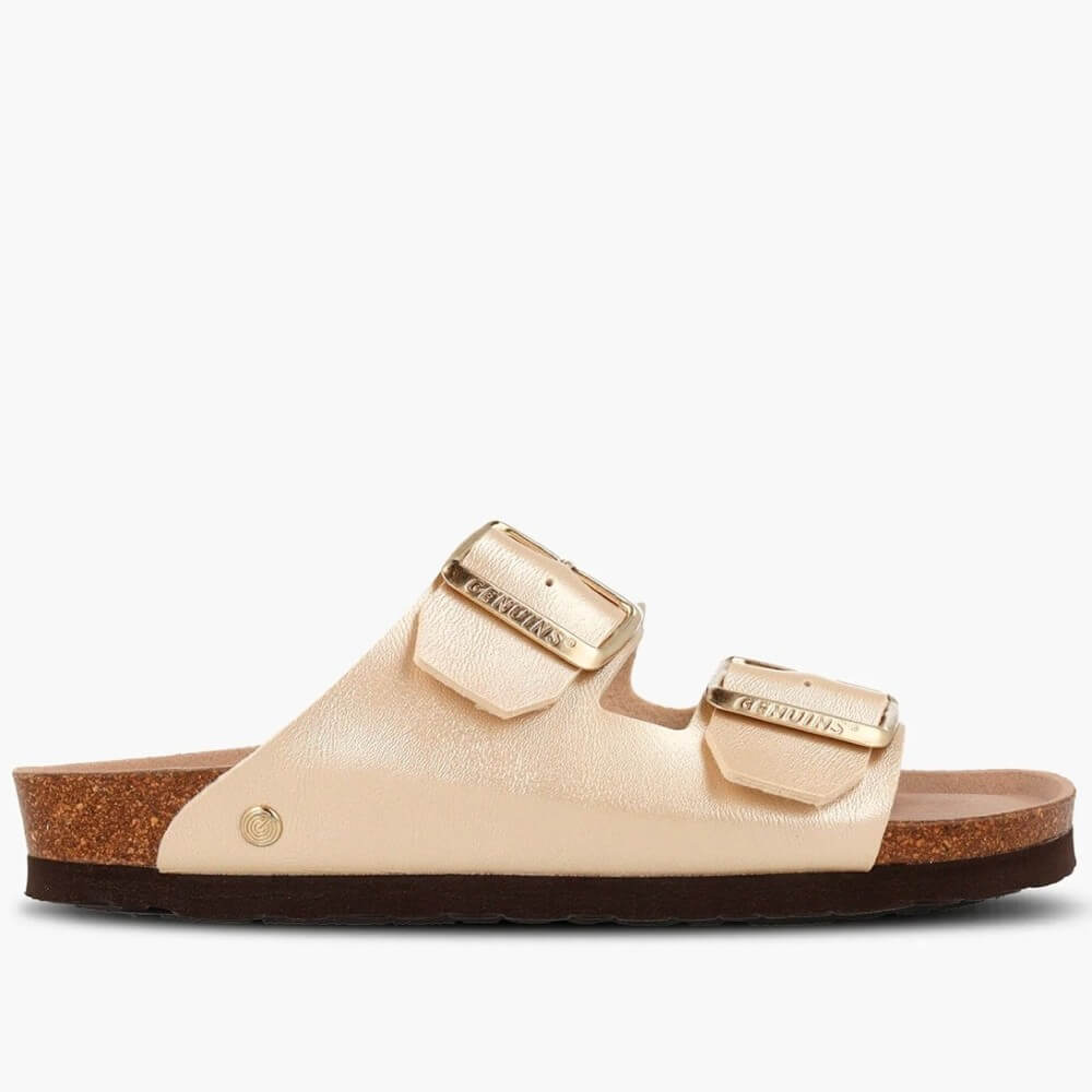 Genuins gold sandal with gold buckles on a white background