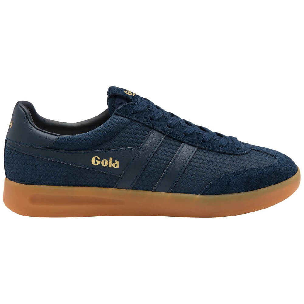 A navy blue Gola sneaker with a textured knit upper, navy blue side stripes, gold 'Gola' branding, and a translucent gum sole.