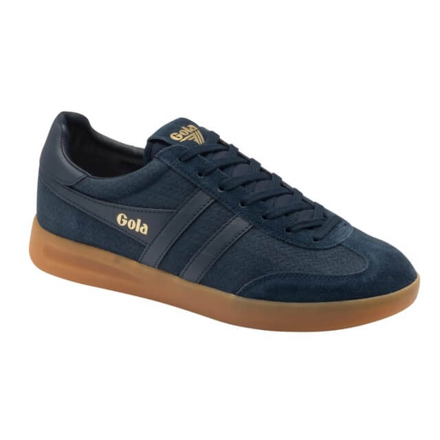 A navy blue suede and leather low-top sneaker with gold 'Gola' branding on the side and tongue, featuring a brown gum sole, shown against a plain white background.