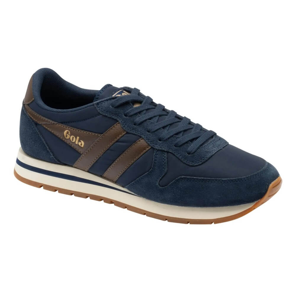 A navy blue suede and canvas sneaker with brown leather side stripes, a cream midsole, and a brown gum outsole. The brand name 'Gola' is printed in gold on the side panel.