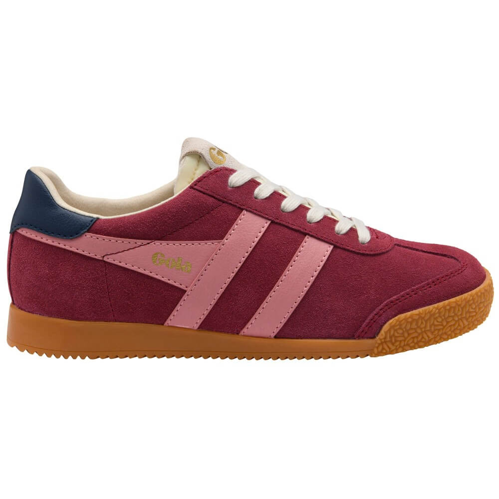 A Gola low-top suede sneaker in burgundy and pink with a navy heel tab, white laces, and a brown gum sole, shown from the side on a white background.