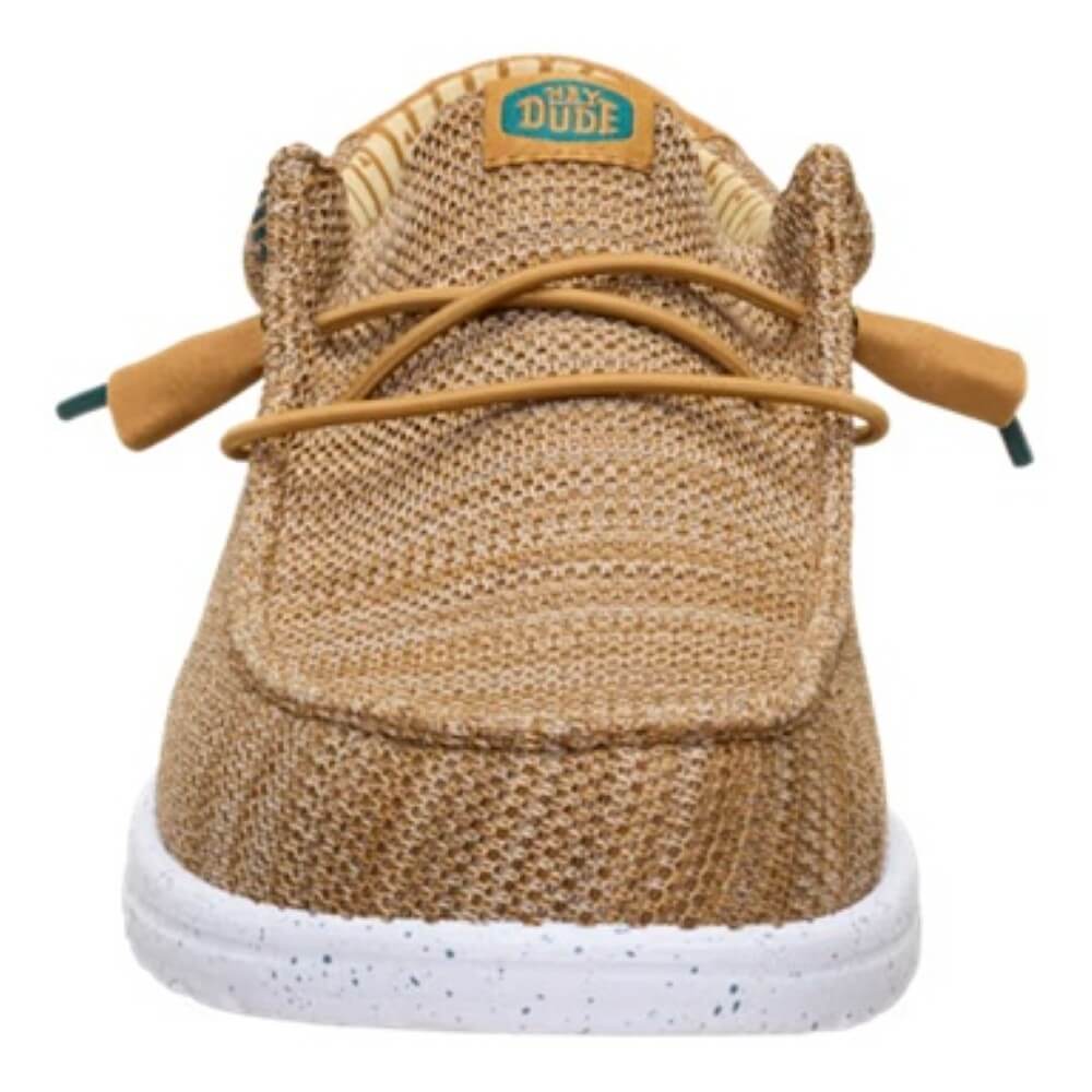 Brown sneaker with white sole on a white background