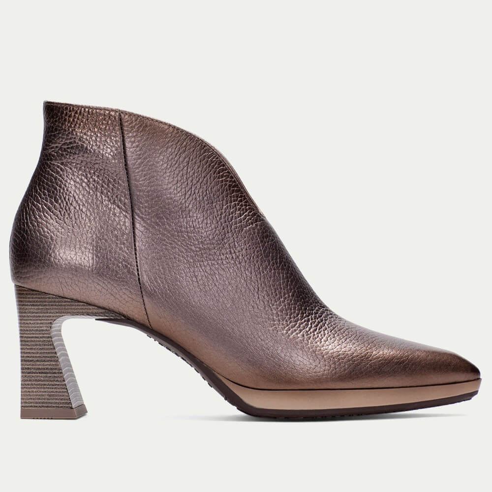 Brown leather ankle boot with a block heel on a light gray background Hispanitas Atlanta HI254270 ankle boot features Metallic Taupe leather with a pointed toe