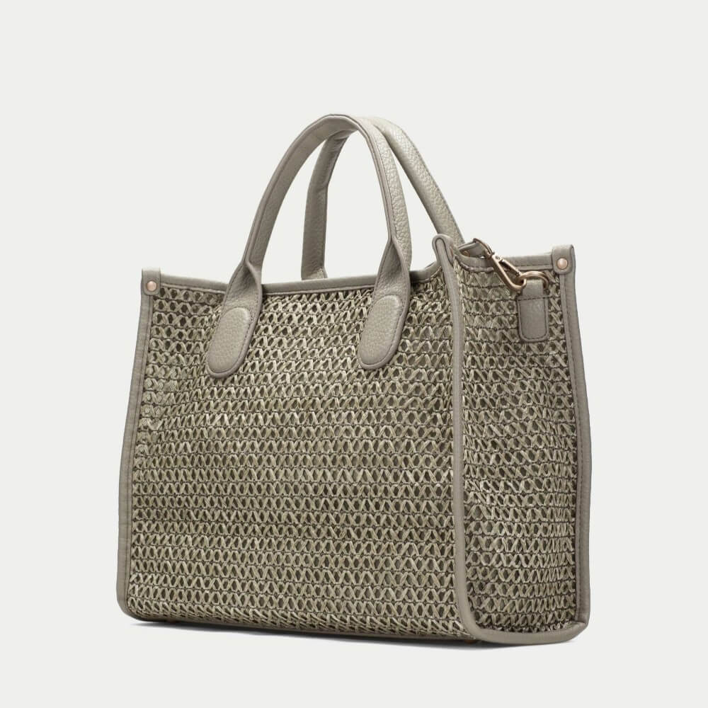 Hispanitas green textured handbag with brand logo on a light grey background