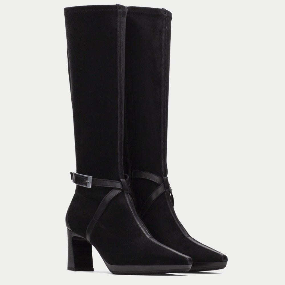 Pair of Hispanitas Black suede Knee High boots with stacked high heels on a white background