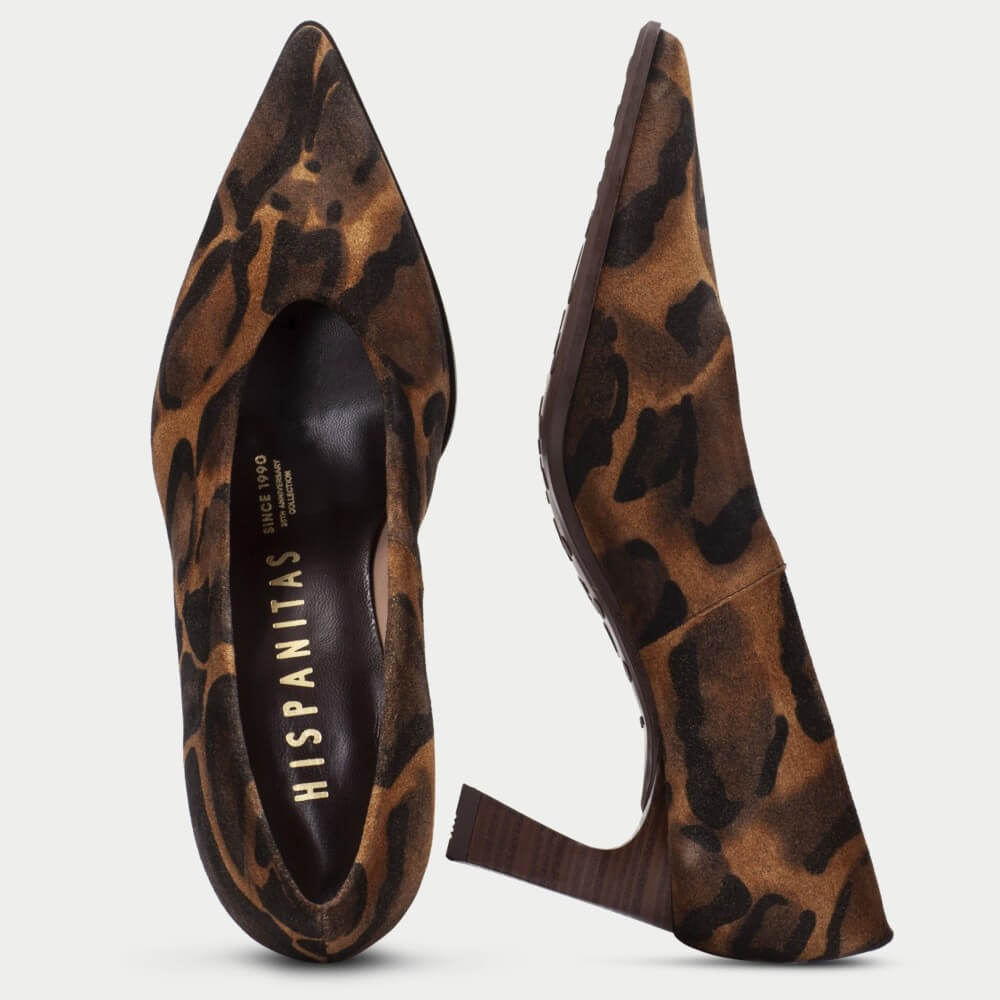 A pair of pointed-toe high heels in a brown and black leopard print, shown from the side and top views on a light gray background. The brand name 'HISPANITAS' is visible on the insole.