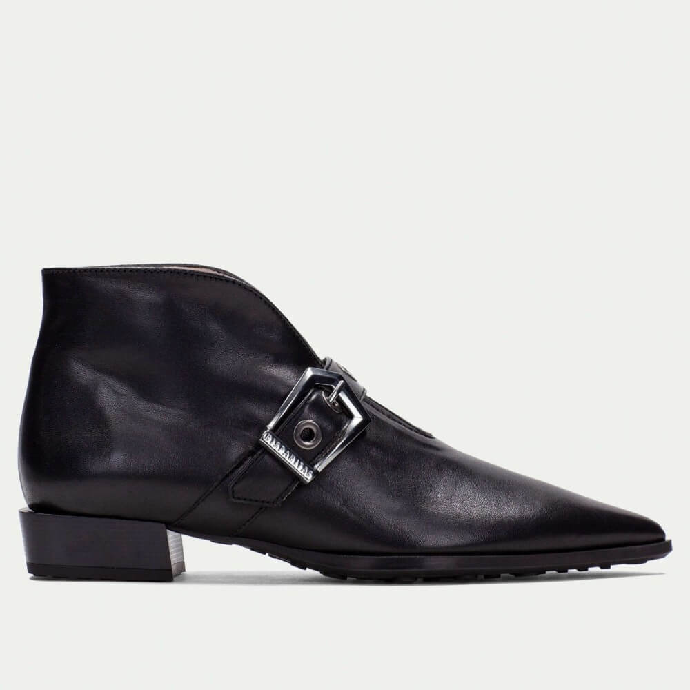 Black leather boot with a buckle on a light gray background Hispanitas Turin Leather Ankle Boot HI254360