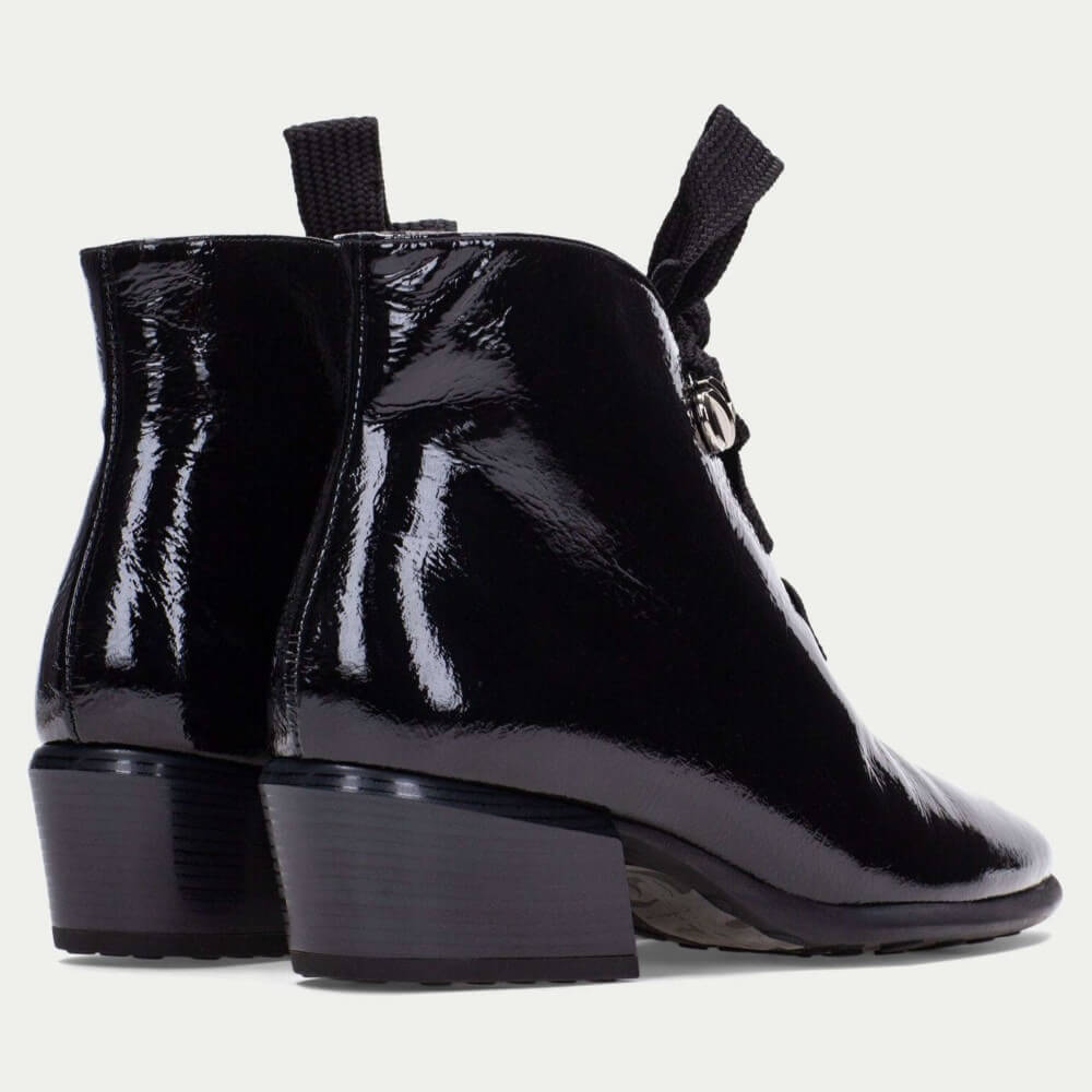 Black patent leather boot with a block heel on a light gray background Hispanitas Verona PHI254255-BLACK ankle boots