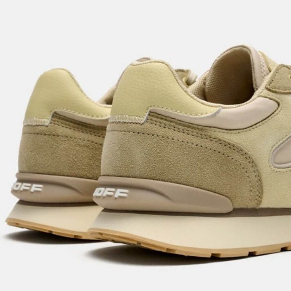 Pair of beige sneakers with 'HOFF' branding on a white background
