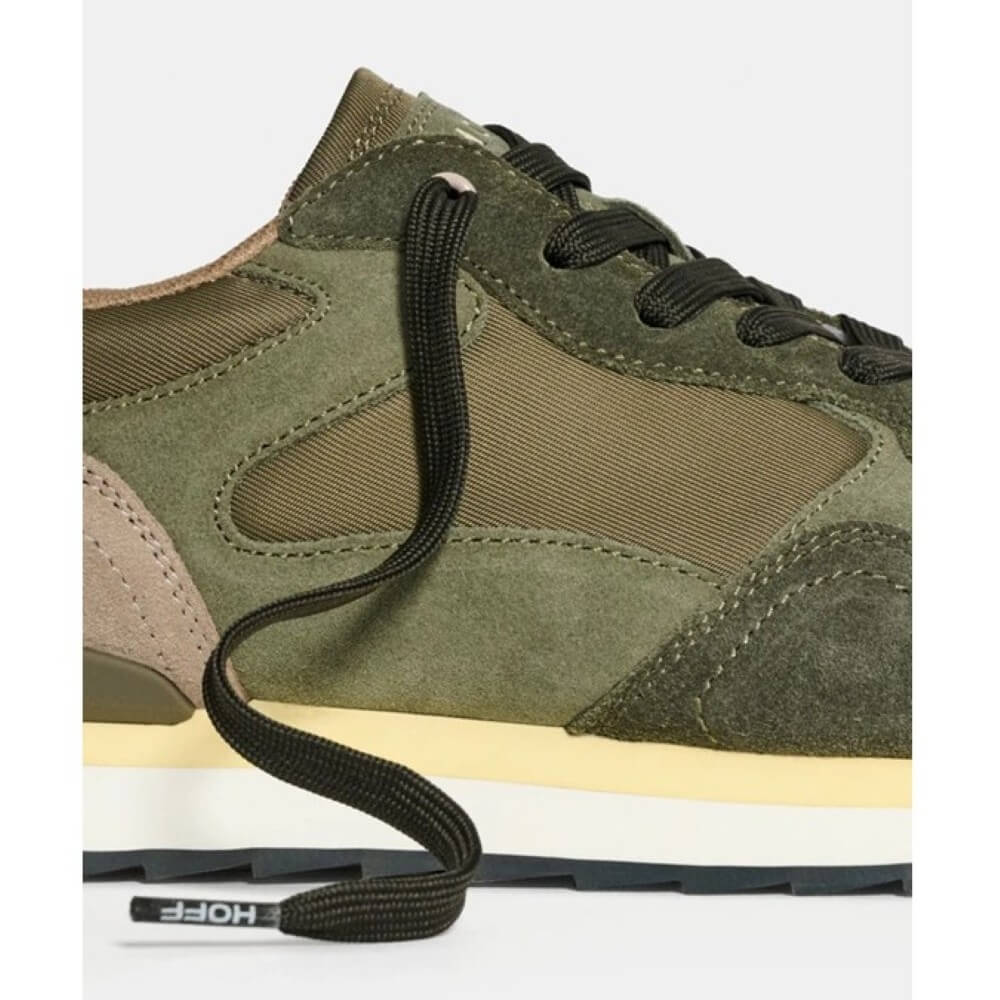 Green and brown sneaker with a white sole on a light gray background Hoff City Buenos Aires Retro Sneaker