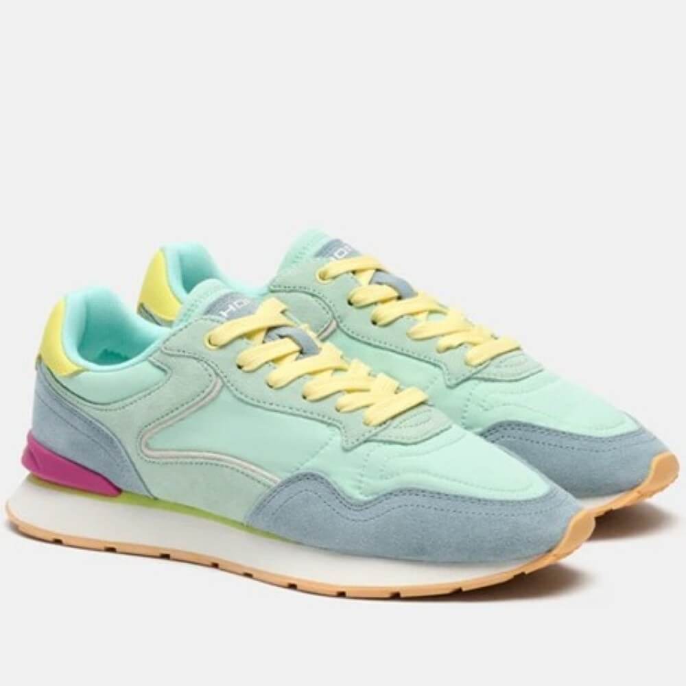 Pair of Hoff pastel green and yellow sneakers on a light grey background
