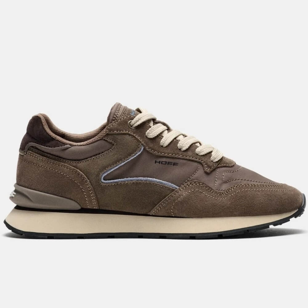 A Hoff Taupe brown suede and leather sneaker with cream laces and a thick cream midsole, featuring the HOFF logo on the side, shown against a light grey background.