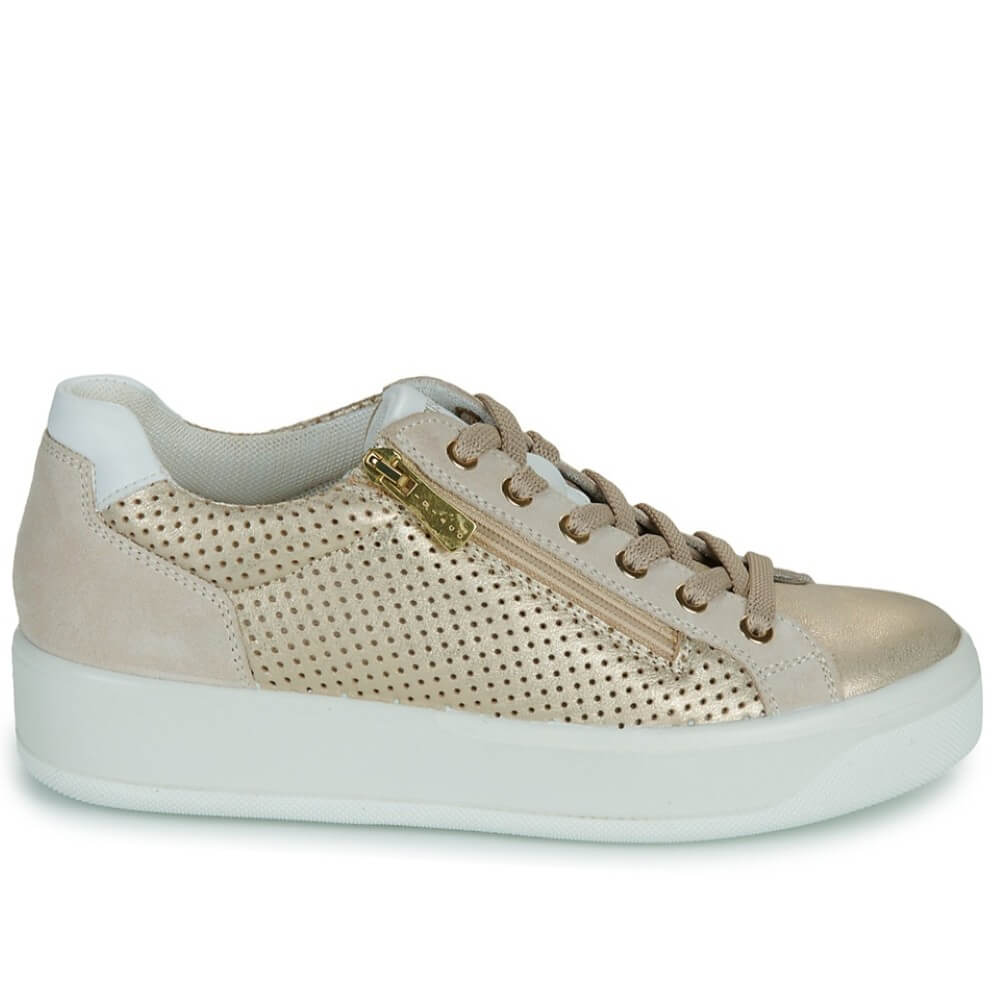 Gold sneaker with white sole on a white background