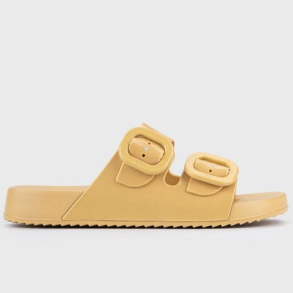 Igor Yellow sandal with a strap on a light gray background