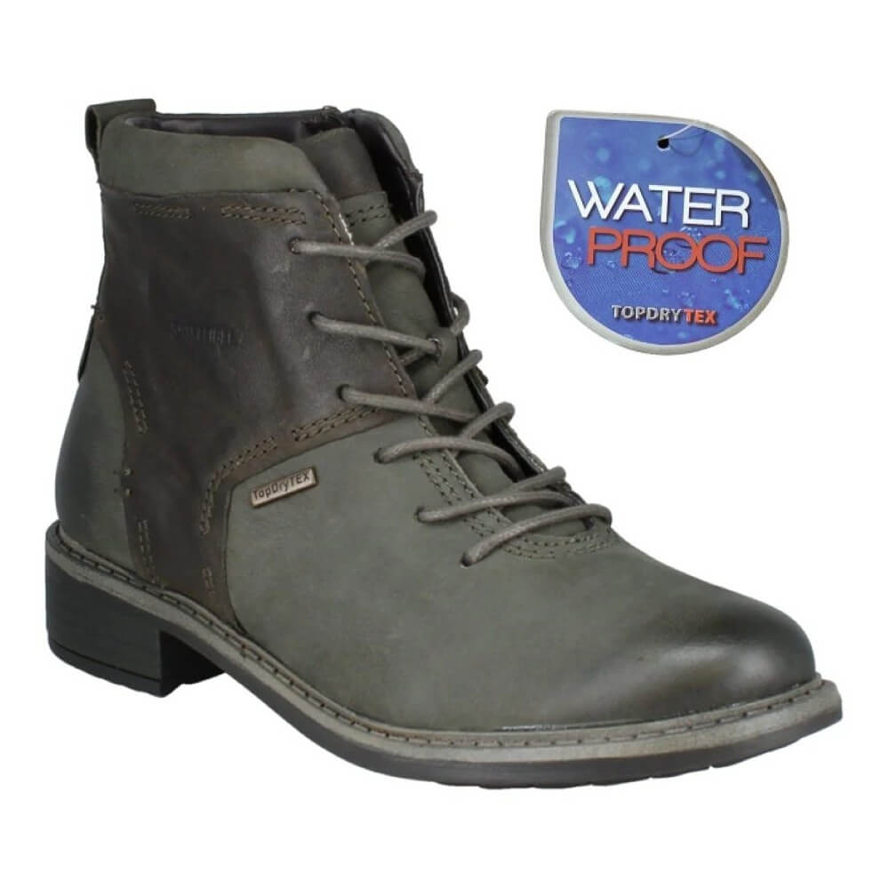 Green lace-up boot with waterproof label on a white background