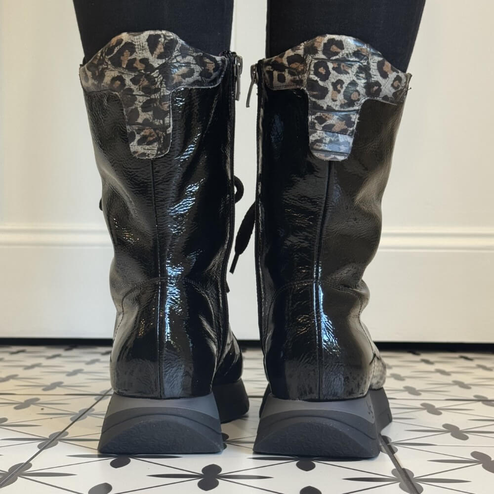Black patent leather boots with leopard print accents Black patent leather combat boot Jose Saenz Laced Boot 2272-BLACK features a patent leather finish