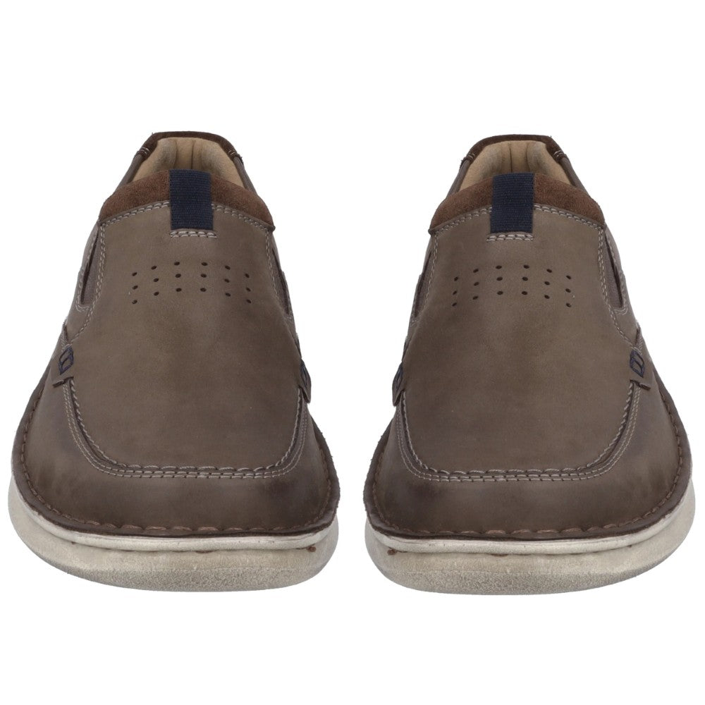 Pair of brown leather shoes on a white background